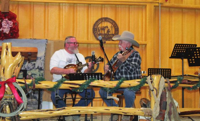 Live music was performed by Pastor Tator Paschal and David Partain at the second annual Cowboy Christmas Market and Craft Fair at the Bosque County Cowboy Church outside Meridian Saturday. Brook DeZavala | Meridian Tribune