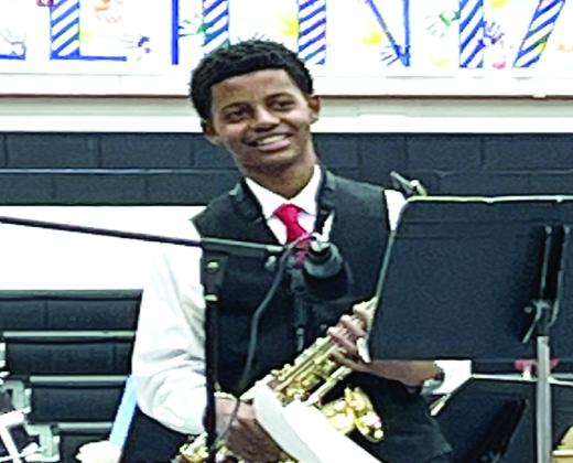 Saxophonist Kenneth Martin performs Kenny G’s version of “Have Yourself a Merry Little Christmas” during the Meridian ISD band department’s annual Christmas concert on Thursday, December 15. Nathan Diebenow | The Meridian Tribune