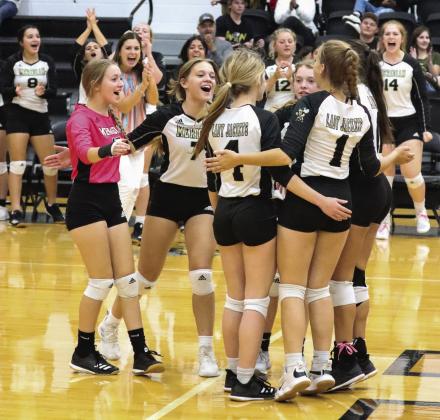 The playoff-bound Meridian Lady Jackets celebrate their season finale victory over the Morgan Eagles. Photo by Wendy Orozco courtesy of Brett Voss’ The Sports Buzz