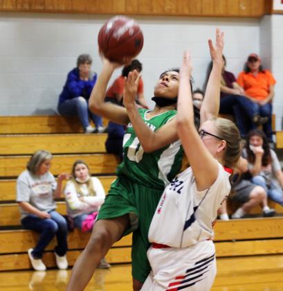 Forrest Murphy/Clifton Record/Morgan's Nia Aviles (10) and the Lady Eagles defeated JCSA, 54-19 Tuesday.