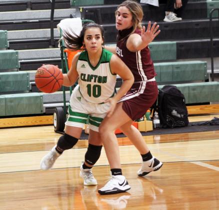 Forrest Murphy/Clifton Record/Clifton sophomore Kambrie Kettler (10) drives past a defender.