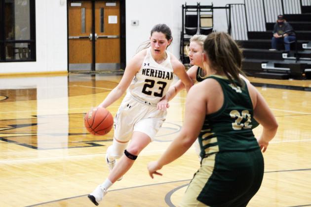 Forrest Murphy/Meridian Tribune/Meridian junior Jaci Clifton (23) and the Lady Jackets closed out District 12-2A competition last week with a five-game stretch spanning Tuesday through Saturday.