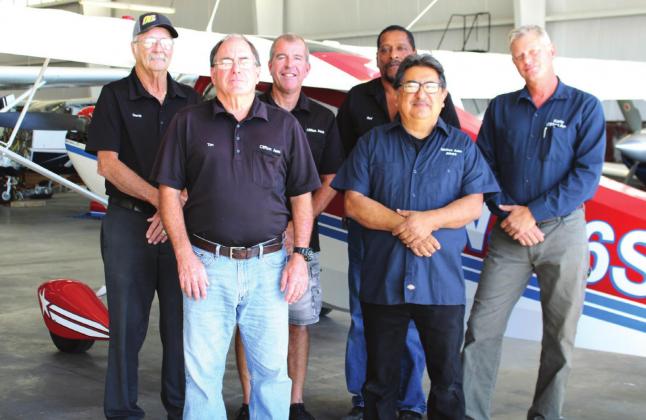 Clifton Aero is one of the businesses that operates at the Clifton Municipal Airport. From back left is David Everett, Mark Ayers, Rod Allen and Karlo Keedy. Front from left is Tim Talley and Albert Quinones. Ashley Barner | The Clifton Record