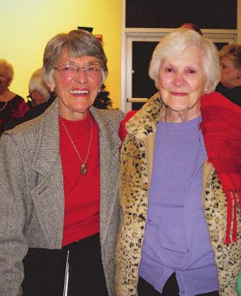 Joy Trotter Williamson in December 2017 when she was honored for her role as first director of the Bosque Chorale in 2009. She is pictured here with her late friend Betty Bronstad. Photo Courtesy of Debra Evans