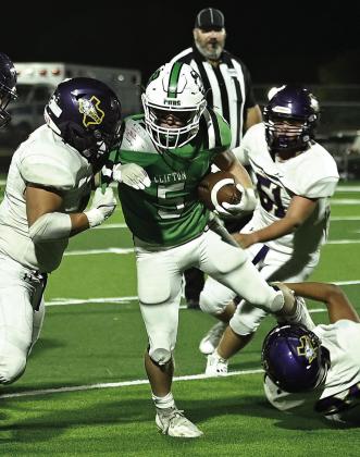 Cub junior running back Parker Tunnell (5) fights for yardage against the Buffalo Bison Friday night. Photo Courtesy of Brett Voss’ The Sports Buzz