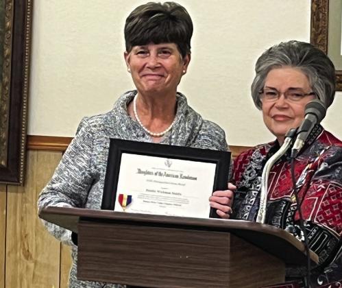 From left, Debbie Stubbs is awarded the DAR Distinguished Citizen Medal by Honorary Chapter Regent Sue Fielden. Courtesy Photo