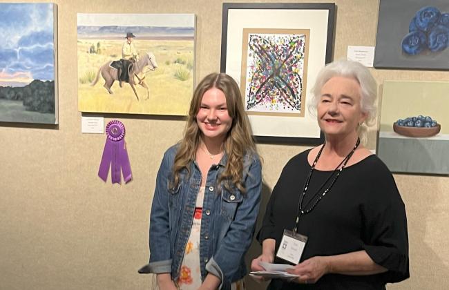 Rebekah Tyler (from left) won “Best in Show” for her painting “A Golden Outlook” at the 21st Annual Bosque Art Center’s High School Art Show as judged by local professional artist Ann Patton on Saturday, March 2. Nathan Diebenow | The Clifton Record