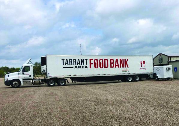 The Tarrant-Area Food Bank drops off free, fresh food for distribution to any family meeting the income eligibility requirements at Cub Stadium in Clifton every second Wednesday, from 1:30 p.m. - 3:30 p.m. The Clifton Mobile Food Pantry is one of many locales receiving food from the TAFB in Bosque County. Courtesy Photo By Immanuel Lutheran Church