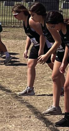 Meridian girls team cross country runners stand ready at the starting line at last week’s meet. Courtesy Photo