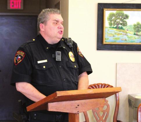 Meridian Police Chief Blake Johnson steps up to speak at the Meridian Chamber of Commerce meeting Thursday afternoon. Brook DeZavala | Meridian Tribune