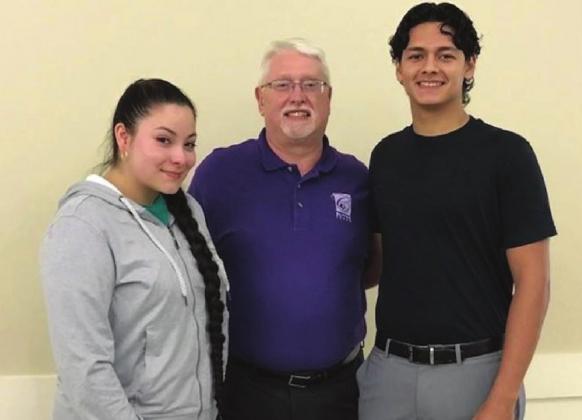 Administered by the Civic Improvement Society, the Nellie Pederson Civic Library awarded two scholarships for $2,500 each. Shown from left is Yohima Tarin, Library Director Lewis Stansell and Carlos Villarreal. Courtesy Photo