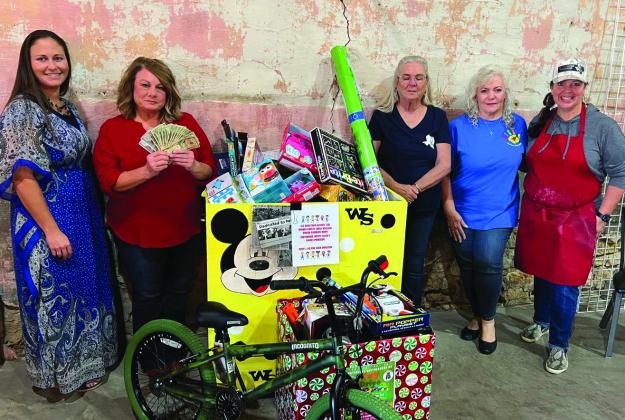 The Bosque County Child Welfare Board received donations from the Rattlesnake Ballroom’s first toy drive for children in foster care on Tuesday, November 28. Representatives of the board receiving the donations include (from left) Tiffany Gentry, treasurer; Kelly Olsen, secretary; Paula Pilcher, vice president/Rainbow Room Coordinator; Amanda Stumpf, member; Laura Bush, venue owner. Photo Courtesy by Bosque Child Welfare Board