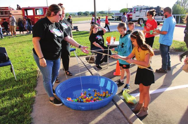 Meridian Elementary School teachers set up games and activities for students at the annual Fall Carnival where students get to enjoy fun games and tasty treats. Brook DeZavala | Meridian Tribune