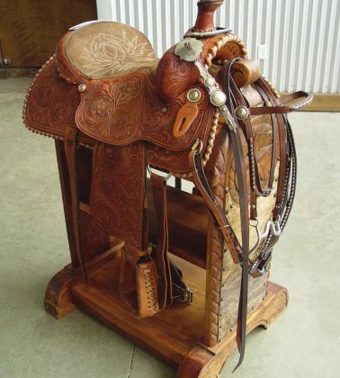 This custom-made, hand-tooled saddle donated by Roland and Joyce Jones is just one of the many terrific items in the Bosque Arts Center’s e-BAC online auction which runs 9 a.m. on March 23 to 9 p.m. on March 30. Courtesy Photo