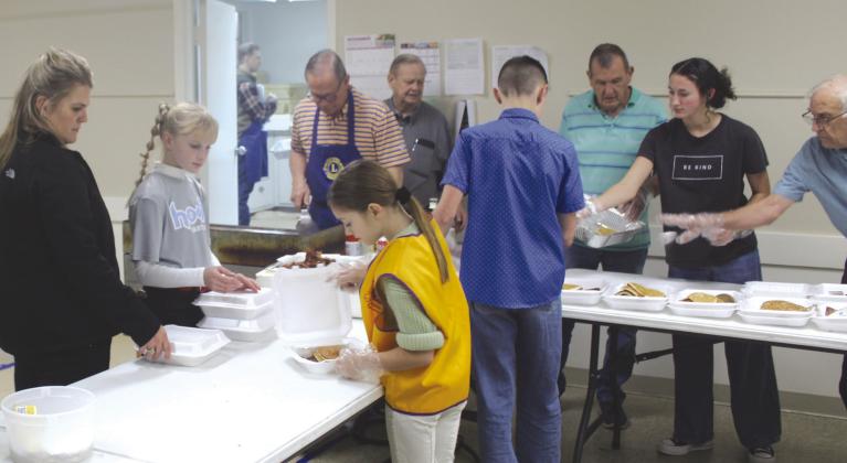 Nathan Diebenow | Meridian Tribune The Clifton Lions Club’s to-go unit modelled multi-generational teamwork during its annual fall pancake supper on Thursday, November 16, at the Clifton Civic Center.