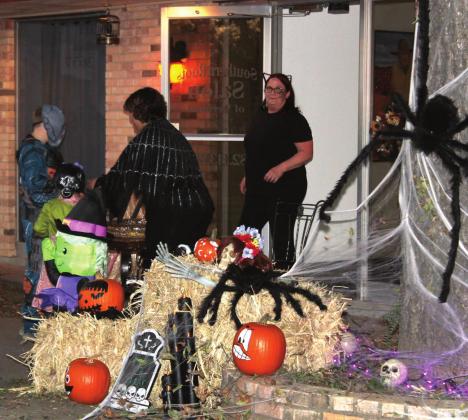 Main Street in Meridian saw a good turnout of trick-or-treaters as businesses and homes passed out candy to the ghosts and goblins wandering around town. Brook DeZavala | Meridian Tribune