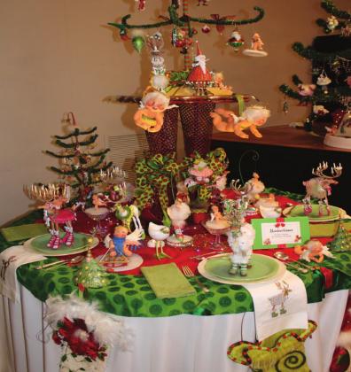 Susan Frazier and Darlene Thomas’s “Reindeer Games” is one of many holiday-themed tablescapes on display at the BAC. Brook DeZavala | The Clifton Record