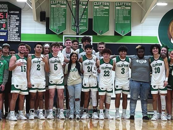 The Clifton High School boys basketball team celebrates after a victory over Whitney, landing them a spot in the playoffs. This will be Clifton’s first playoff appearance since 2005. Photo Courtesy of Clifton ISD