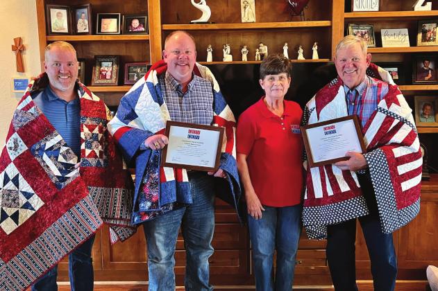 Debbie Stubbs presents Quilts of Valor to father and son, Lawrence and David Zuehlke of Clifton. From left is Howard Bennett, David Zuehlke, Debbie Stubbs and Lawrence Zuehlke. Courtesy Photo