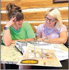 Clifton FallFest Committee Co-Chairs Kat Kennedy and Amanda Hoff review plans for the 22nd Annual FallFest in Clifton set for Saturday, October 21. Nathan Diebenow | The Clifton Record