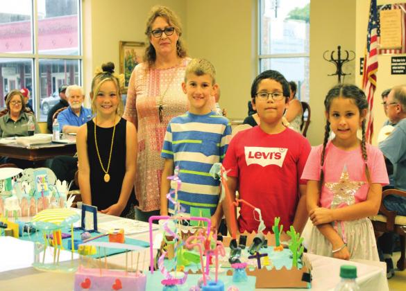 Harley Moore, Parker Hurley, Dewayne Hinson and Sadie Yant, along with MISD science teacher Mrs. Baucom presented their Splash Park Community Project to the Meridian City Council Monday evening. Ashley Barner | Meridian Tribune