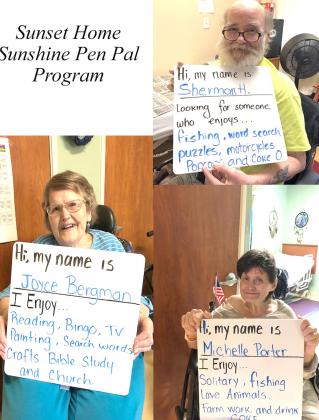 Sunset residents hold up signs asking for pen pal on social media last week in Clifton. Allen D. Fisher | Meridian Tribune
