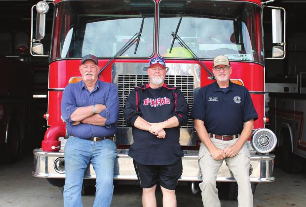 From left, Iredell Fire Chief Bradley Fletcher and Meridian Fire Chief Kevin Brister meet with Bosque County Fire Marshall Kirk Turner to discuss actions local fire departments can take to bolster their roster and volunteers available for response. Brook DeZavala | Meridian Tribune